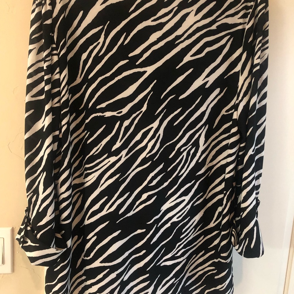 NW/O tags. Ladies Top in size Large